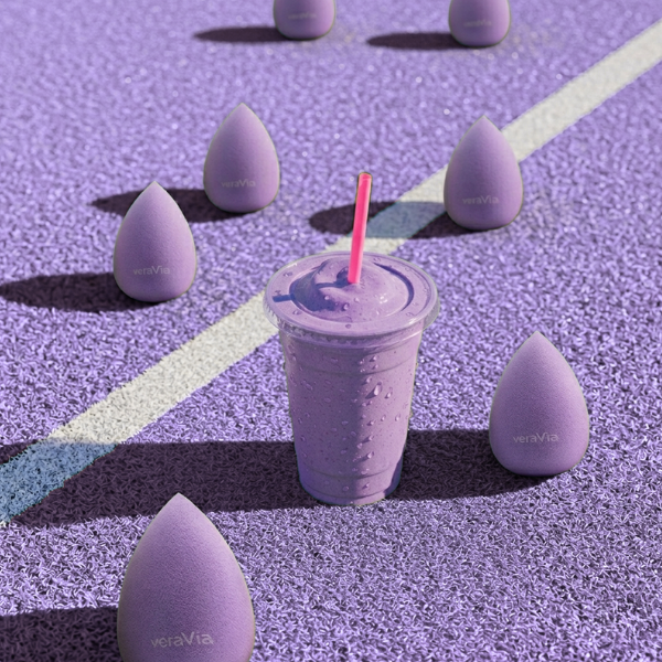 creative arts of veraVia purple blending sponges on a road with beverage drink cup