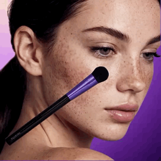 professional model application for freckle blemish coverage with veraVia flat round concealer brush
