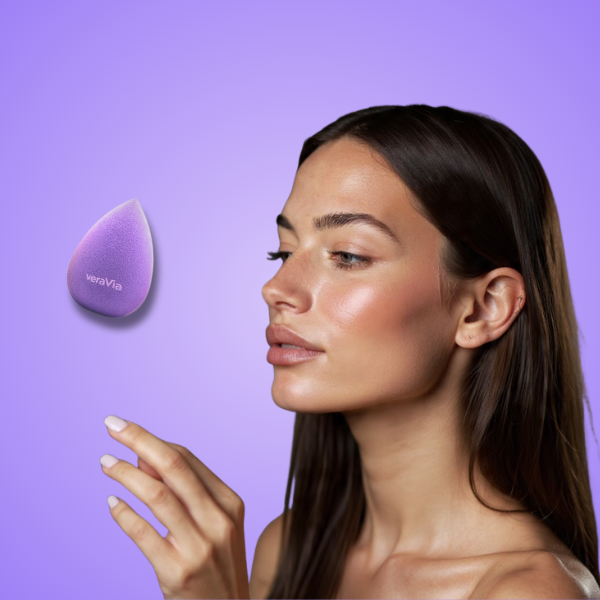 professional model face makeup application with veraVia seamless lavender sponge