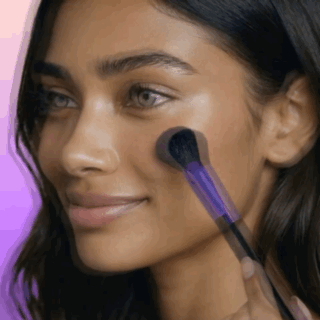professional model natural gradient cheek blush application with veraVia angled cosmetics brush