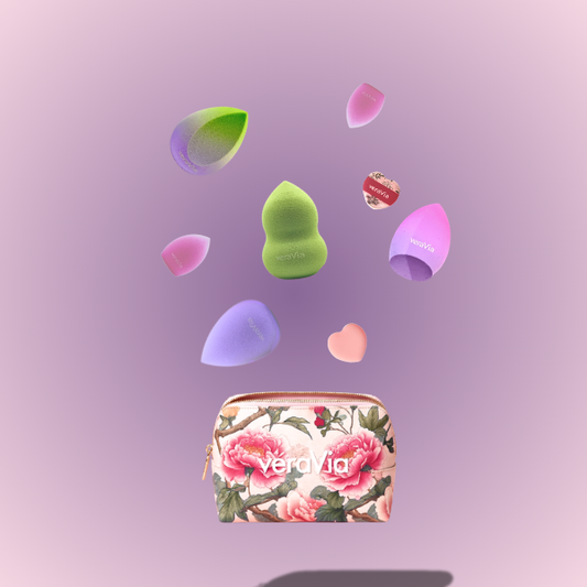 veraVia aurora series beauty sponges floating above a luxury floral makeup pouch