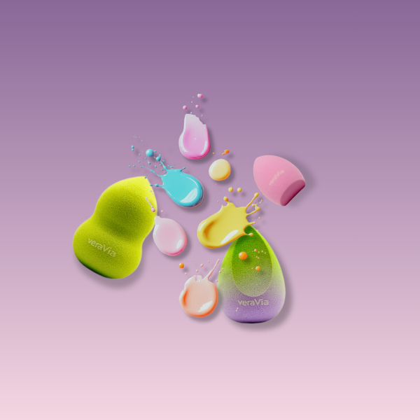 veraVia blush harmony beauty sponges with colorful liquid foundation splashes on purple background
